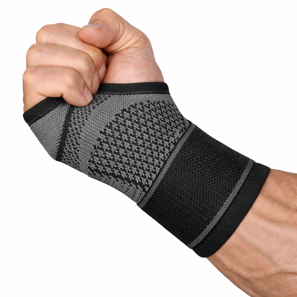 Compression wrist support with targeted zones for stability and comfort during intense workouts